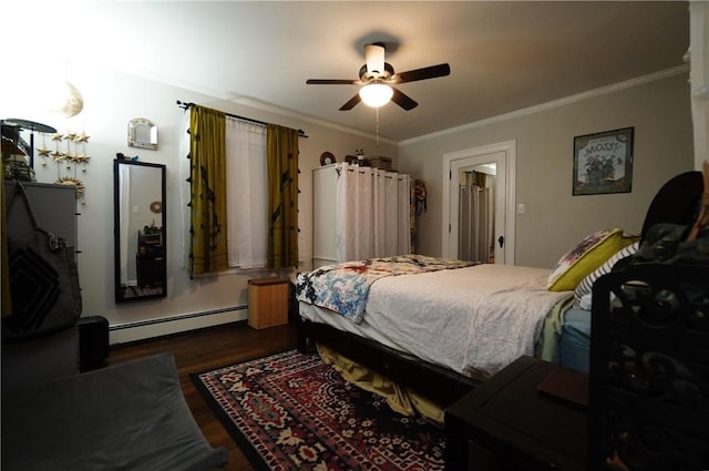 318 Saint Paul St, North Smithfield, RI 02896 - bedroom with baseboard heating, crown molding, wood finished floors, and ceiling fan