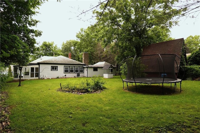 318 Saint Paul St, North Smithfield, RI 02896 - view of grassy yard with a trampoline