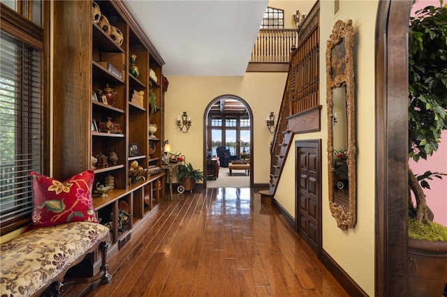 17 Pojac Point Rd, North Kingstown, RI 02852 - corridor with hardwood / wood-style floors and arched walkways