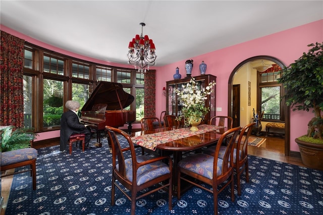 17 Pojac Point Rd, North Kingstown, RI 02852 - dining space with a chandelier and arched walkways