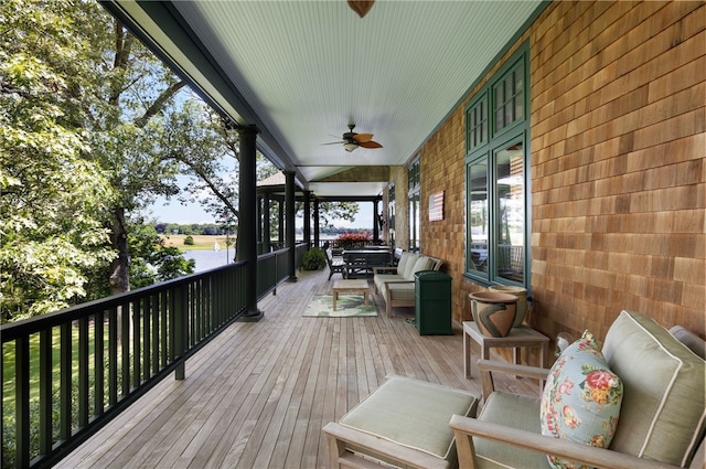 17 Pojac Point Rd, North Kingstown, RI 02852 - wooden terrace featuring ceiling fan and a water view