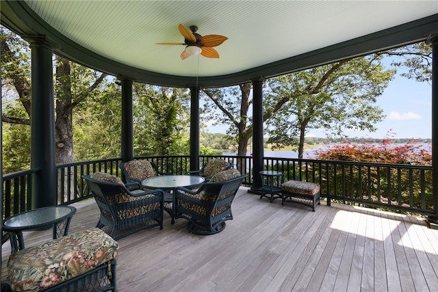 17 Pojac Point Rd, North Kingstown, RI 02852 - wooden terrace featuring a ceiling fan and outdoor dining space