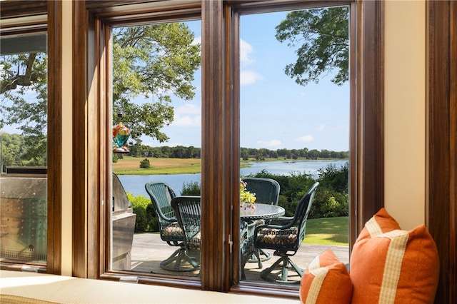 17 Pojac Point Rd, North Kingstown, RI 02852 - doorway to outside with a water view, healthy amount of natural light, and view of scattered trees