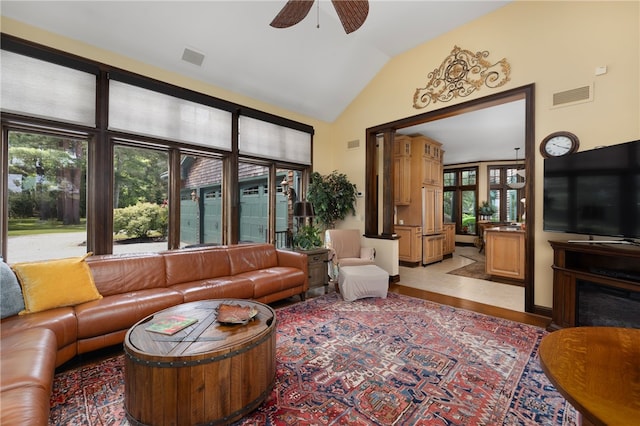 17 Pojac Point Rd, North Kingstown, RI 02852 - living area with vaulted ceiling, ceiling fan, and light wood-style floors