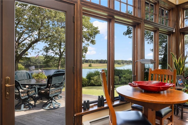 17 Pojac Point Rd, North Kingstown, RI 02852 - sunroom / solarium with a water view, healthy amount of natural light, and a baseboard heating unit