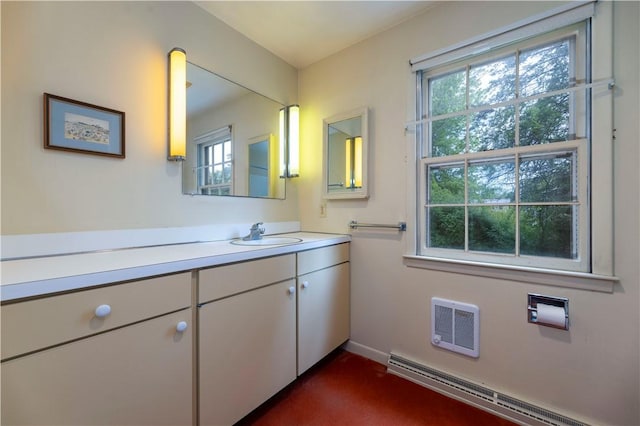 61 Bay View Rd, Charlestown, RI 02813 - bathroom featuring baseboard heating, vanity, and heating unit
