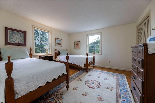 61 Bay View Rd, Charlestown, RI 02813 - bedroom featuring light wood-style flooring and baseboards