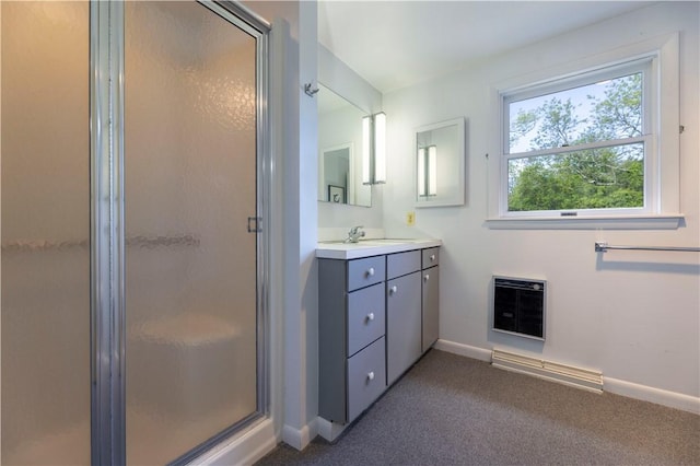 61 Bay View Rd, Charlestown, RI 02813 - full bath with heating unit, a stall shower, vanity, and carpet