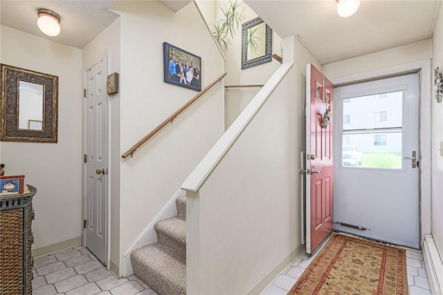 66 Girard Ave Unit 322, Newport, RI 02840 - foyer entrance with stairs and light tile patterned floors