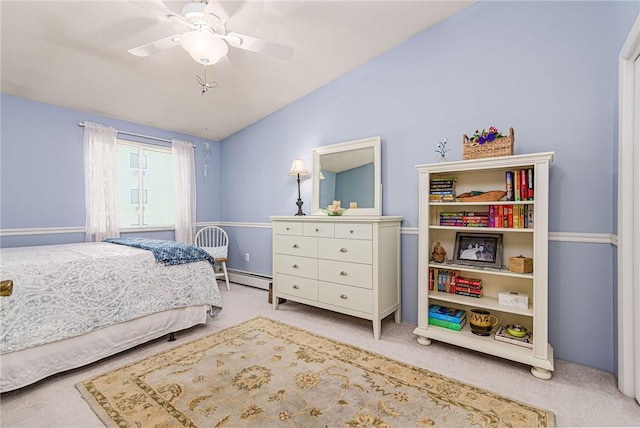 66 Girard Ave Unit 322, Newport, RI 02840 - carpeted bedroom featuring a baseboard heating unit, vaulted ceiling, and ceiling fan