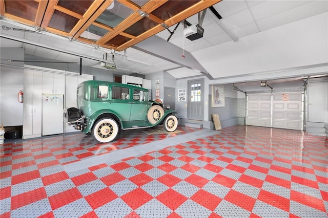 6 Lachance Ave, Warwick, RI 02889 - garage featuring a garage door opener