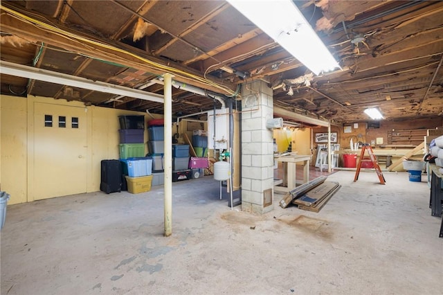 6 Lachance Ave, Warwick, RI 02889 - unfinished below grade area with a workshop area