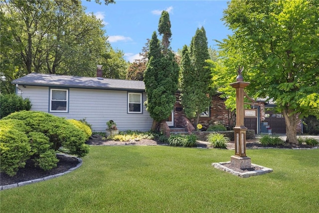 6 Lachance Ave, Warwick, RI 02889 - rear view of property featuring a yard and a chimney