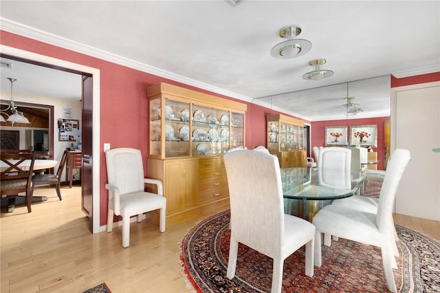 6 Lachance Ave, Warwick, RI 02889 - dining space featuring wood finished floors and ornamental molding