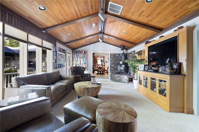 6 Lachance Ave, Warwick, RI 02889 - carpeted living area with wood ceiling, recessed lighting, and a wood stove