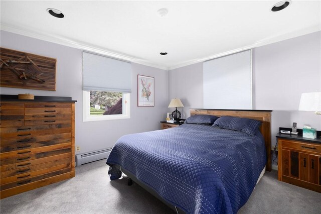6 Lachance Ave, Warwick, RI 02889 - carpeted bedroom featuring a baseboard heating unit, crown molding, and recessed lighting
