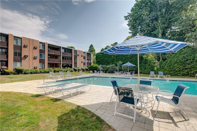 401 Bellevue Ave Unit 214, Newport, RI 02840 - community pool featuring a patio and a yard
