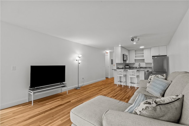 401 Bellevue Ave Unit 214, Newport, RI 02840 - living area with light wood finished floors and recessed lighting