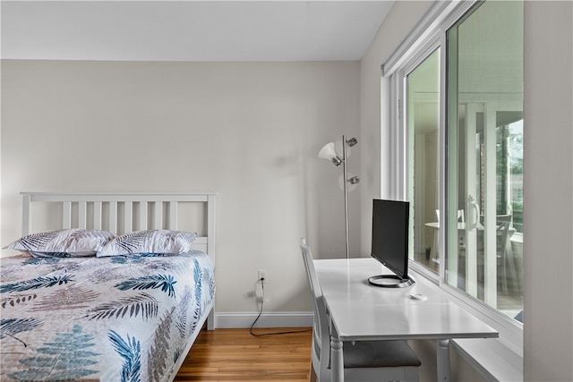 401 Bellevue Ave Unit 214, Newport, RI 02840 - bedroom featuring wood finished floors and baseboards