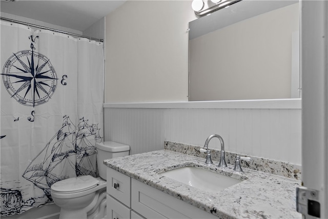401 Bellevue Ave Unit 214, Newport, RI 02840 - full bathroom featuring a wainscoted wall, vanity, and a shower with curtain