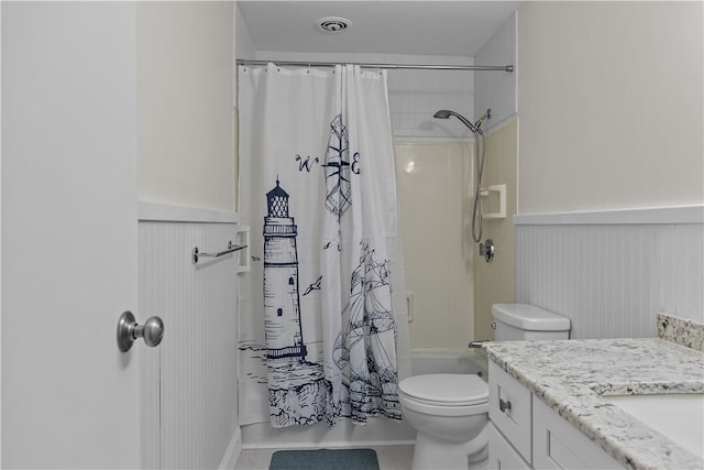 401 Bellevue Ave Unit 214, Newport, RI 02840 - full bath with wainscoting, vanity, shower / tub combo with curtain, and tile patterned flooring