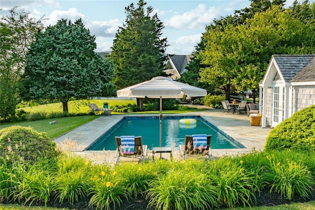 1003 Fort Getty Rd, Jamestown, RI 02835 - outdoor pool with a patio area, a lawn, and an outdoor structure