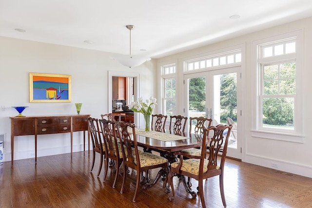 1003 Fort Getty Rd, Jamestown, RI 02835 - dining space featuring wood finished floors and baseboards
