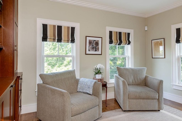 1003 Fort Getty Rd, Jamestown, RI 02835 - living area with plenty of natural light, crown molding, and light wood finished floors