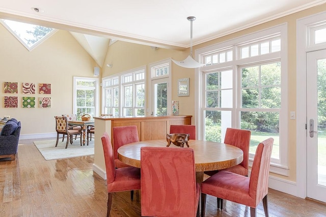1003 Fort Getty Rd, Jamestown, RI 02835 - dining room featuring light wood finished floors and ornamental molding