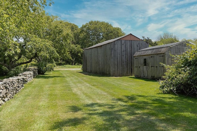 1003 Fort Getty Rd, Jamestown, RI 02835 - view of grassy yard with an outdoor structure