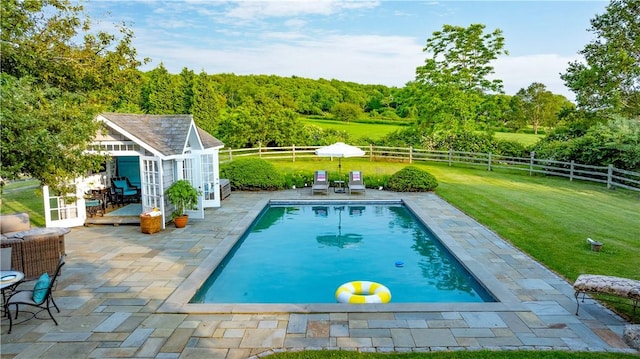 1003 Fort Getty Rd, Jamestown, RI 02835 - view of swimming pool featuring a patio, an outdoor structure, a fenced backyard, and an exterior structure