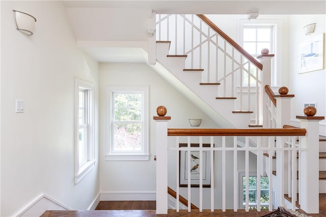 1003 Fort Getty Rd, Jamestown, RI 02835 - stairs with baseboards and wood finished floors