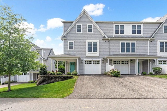 100 Algonquin Rd Unit 5, Narragansett, RI 02882 - shingle-style home featuring driveway, an attached garage, and a front yard