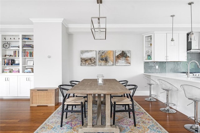 100 Algonquin Rd Unit 5, Narragansett, RI 02882 - dining space featuring dark wood-type flooring and crown molding