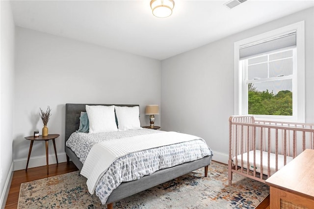 100 Algonquin Rd Unit 5, Narragansett, RI 02882 - bedroom with wood finished floors and baseboards