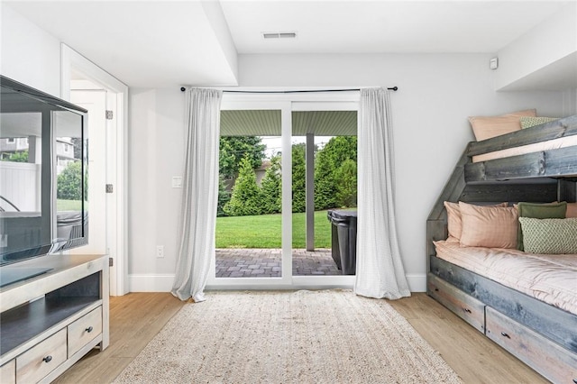 100 Algonquin Rd Unit 5, Narragansett, RI 02882 - bedroom featuring access to exterior and light wood-style flooring