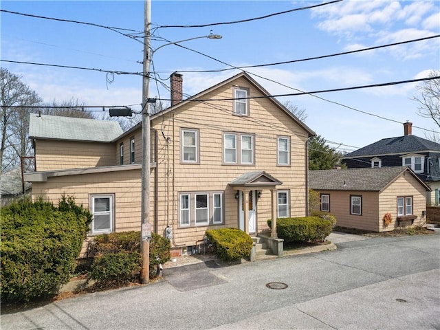 32 Union St, East Greenwich, RI 02818 - view of front of home with a chimney