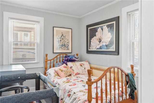 32 Union St, East Greenwich, RI 02818 - bedroom with crown molding, multiple windows, and a decorative wall