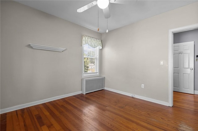 39 Owen Ave, Pawtucket, RI 02860 - empty room featuring radiator heating unit, ceiling fan, and wood finished floors