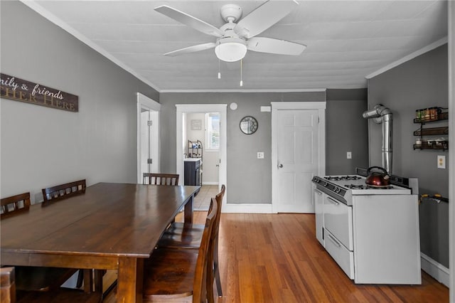 39 Owen Ave, Pawtucket, RI 02860 - dining area with a ceiling fan, wood finished floors, and ornamental molding