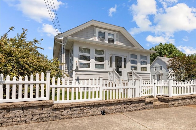 39 Owen Ave, Pawtucket, RI 02860 - bungalow-style house featuring a fenced front yard and entry steps