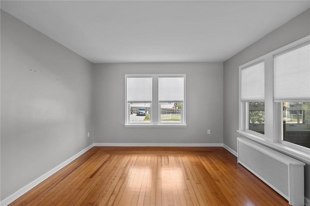 39 Owen Ave, Pawtucket, RI 02860 - spare room featuring radiator, healthy amount of natural light, and light wood-style floors