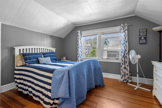 39 Owen Ave, Pawtucket, RI 02860 - bedroom with vaulted ceiling, wood finished floors, cooling unit, and a decorative wall