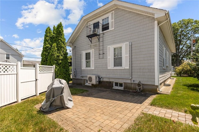 39 Owen Ave, Pawtucket, RI 02860 - rear view of property featuring a patio