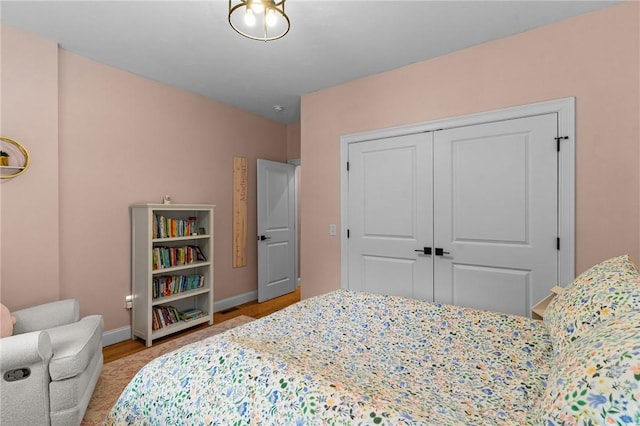 52 Pine Swamp Rd, Cumberland, RI 02864 - bedroom featuring a closet and wood finished floors
