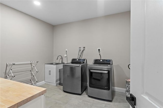 52 Pine Swamp Rd, Cumberland, RI 02864 - laundry area with separate washer and dryer and cabinet space