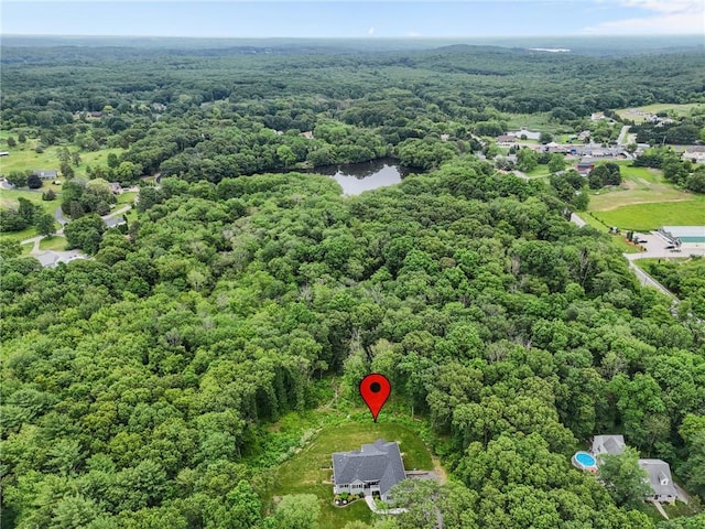52 Pine Swamp Rd, Cumberland, RI 02864 - aerial view of a heavily wooded area and a large body of water