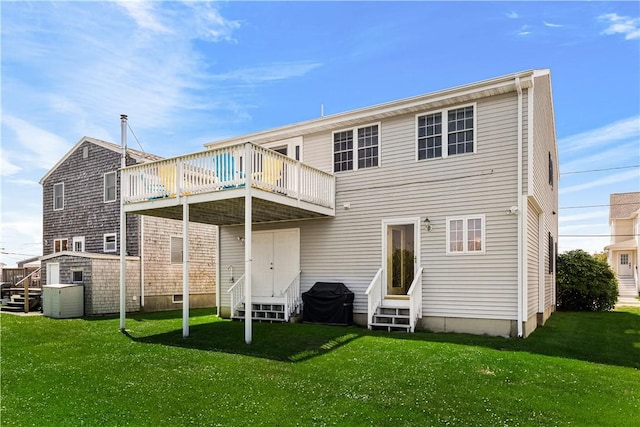 16 Elm Ave, Narragansett, RI 02882 - rear view of property featuring entry steps, a deck, a yard, and a shed
