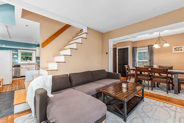 15 N St, Warwick, RI 02886 - living room featuring light wood-style flooring and stairway
