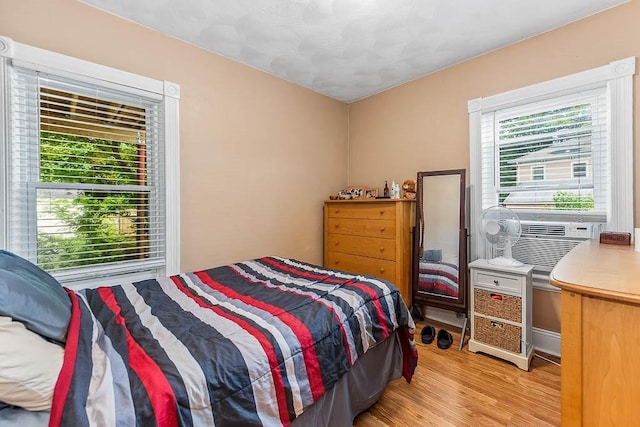 15 N St, Warwick, RI 02886 - bedroom with light wood-style flooring and cooling unit